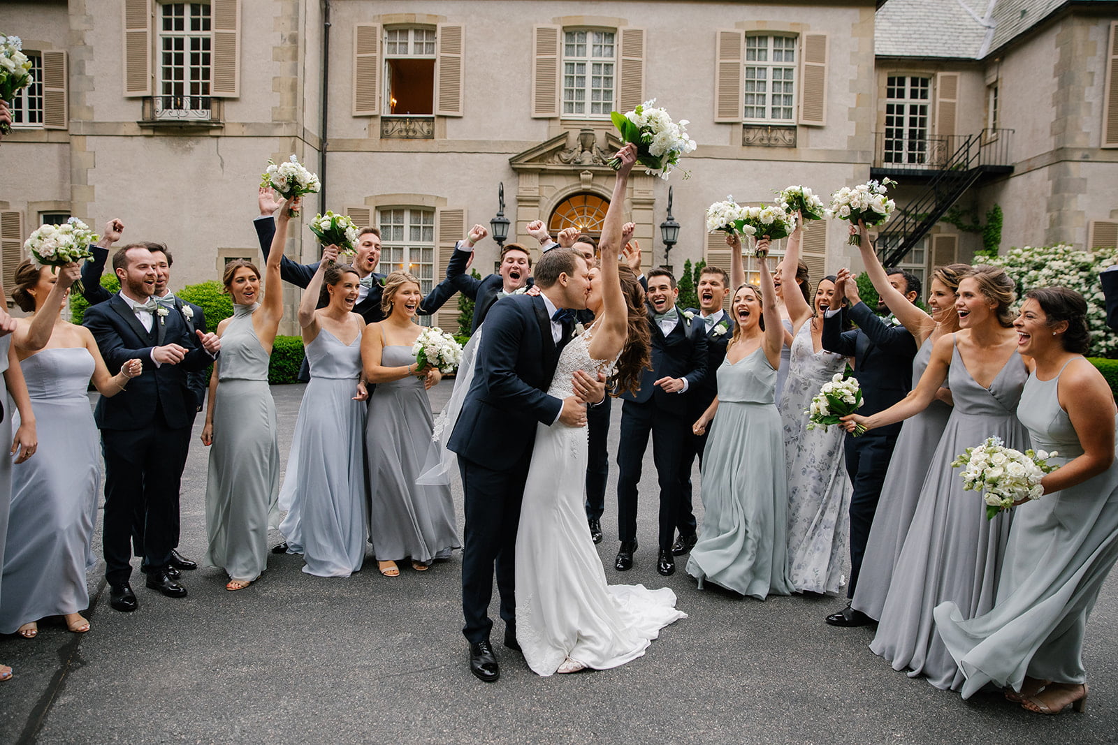 bride and groom with their wedding party