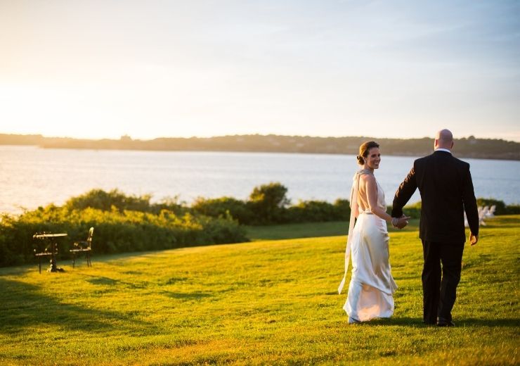 bride and groom walking the grounds at Castle Hill Inn